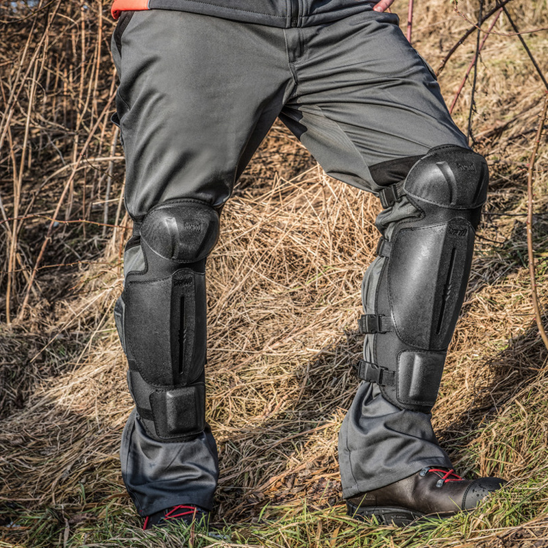 Chrániče holenní k ochranně při řezání s pilou a sekání s křovinořezem dřevorubecké chrániče nohou